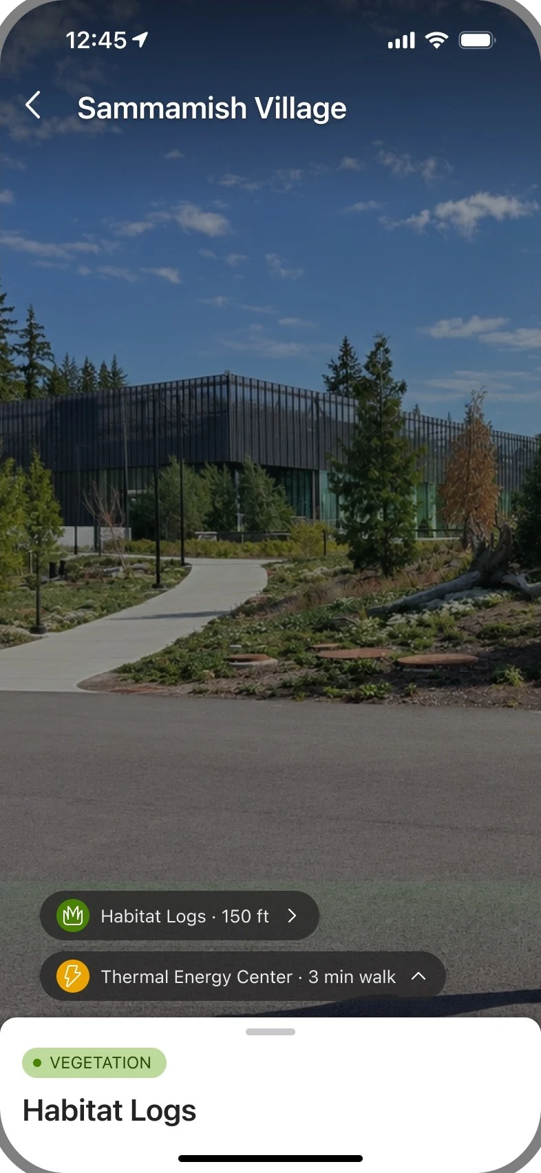Approach, 150 feet: two pills docked at the bottom of the camera — Habitat Logs 150 ft, Thermal Energy Center 3 min walk