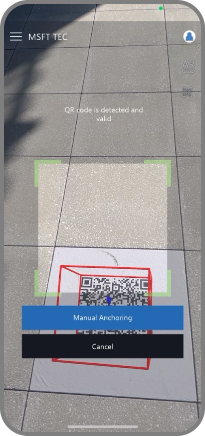 QR detected, the AR layer anchoring to the location