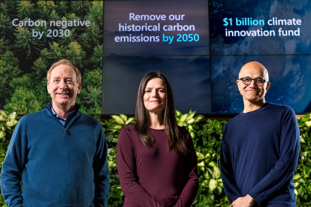 Microsoft's January 2020 climate announcement — screens behind the executives read: carbon negative by 2030, remove historical emissions by 2050, $1 billion climate innovation fund